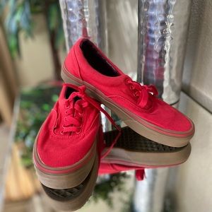Red Vans with gum bottoms